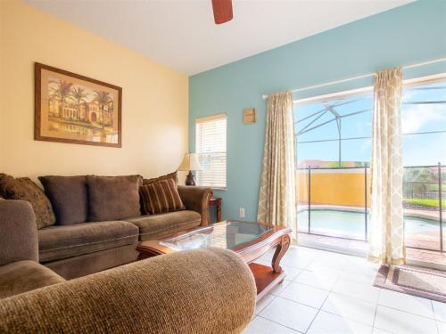 Private Screened Splash Pool Overlooking Tranquil Lake Right Beside Disney World by Florida Dream Homes - image 12