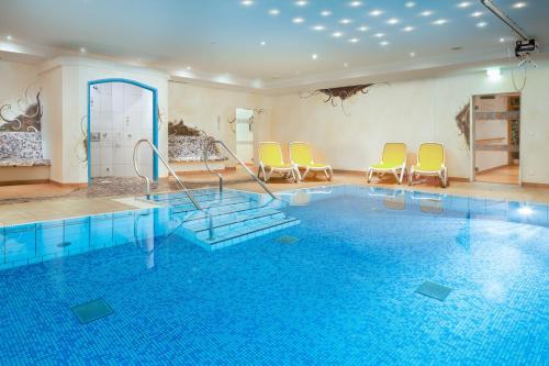 Úszómedence, "Haus 18" - Annehmlichkeiten von 4-Sterne Familien-und Wellnesshotel Viktoria konnen mitgenutzt werd in Reichenbach