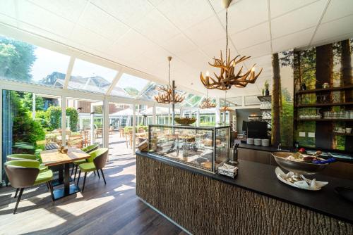 Ресторан, Waldhotel Tannenhauschen in Везель