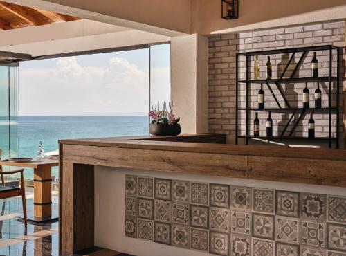 Cavo Orient Beach Hotel & Suites - image 7