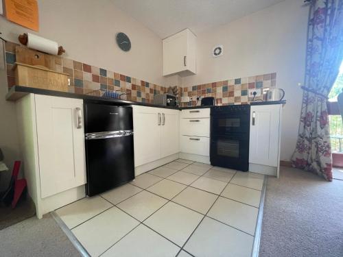 Nethercote Cottage, Kingsize bed, Seven Springs Cottages in Cockleford