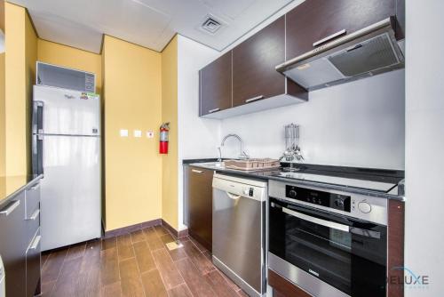 Homely 1BR at The Matrix Dubai Sports City by Deluxe Holiday Homes, Dubaj (fotografie 3)