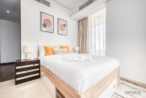 Homely 1BR at The Matrix Dubai Sports City by Deluxe Holiday Homes, Dubaj (fotografie 2)