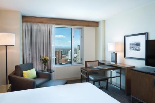 Room with One Queen and One Double Bed with City View