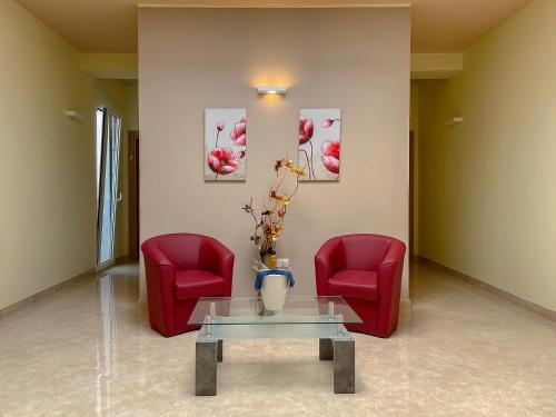 Koplietošanas atpūtas telpa ar TV, Karpignàna Hotel (Karpignana Hotel) in Karpidžnano Salentino