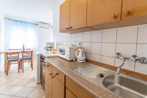 Apartments and rooms by the sea Palit Rab - 5010 - image 13