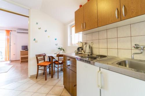 Apartments and rooms by the sea Palit Rab - 5010 - image 6