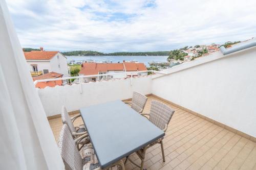 Apartments and rooms by the sea Palit Rab - 5010 - main image