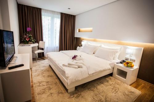 Prestige Hotel Tirana Set in a prime location of Tirana, Prestige Hotel puts everything the city has to offer just outside your doorstep. The hotel offers a wide range of amenities and perks to ensure you have a great time