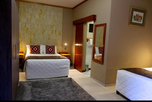 Guestroom, Bloem Spa Hotel & Conference near Kerdoni's Woodland Hills Village