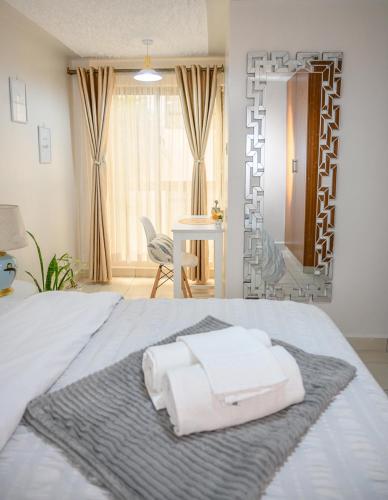 Furnished 1 Bedroom Apartment in Nairobi. 15 Mins to CBD. Free WI-FI & Parking photo