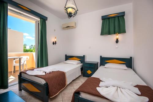 Cirillo Family Hotel-Christinas Studios Room Type - Standard Triple Room
