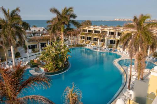 Swimmingpool, Paradise Inn Beach Resort in Alexandria