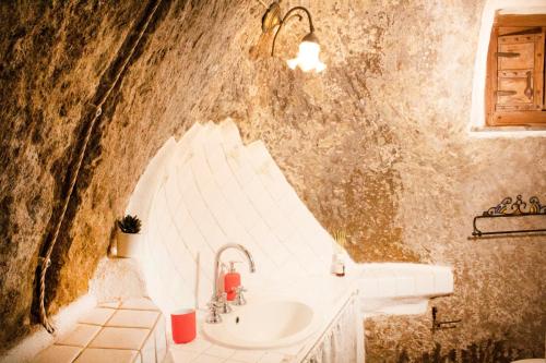 حمام, Casa nella roccia in بومارتسو