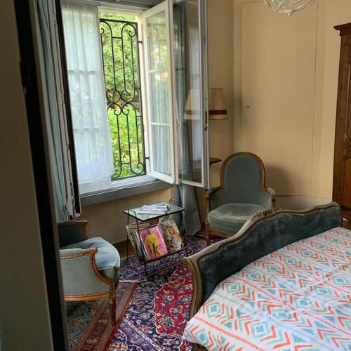 Chambre CHEZ L'HABITANT lit double vue sur jardin Ce n'est pas un Hotel