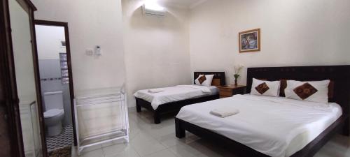 Guestroom, OYO 1190 Ndalem Katong Guest House in Ponorogo