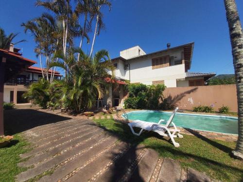 COD109 - Casa com piscina, 5 dorms, ar, Campeche, Fpolis, SC