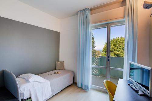 Hotel Ivano - Tap to explore photos