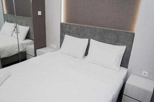 Nice and Tidy Studio Room at Tree Park Apartment By Travelio, Tangerang Selatan