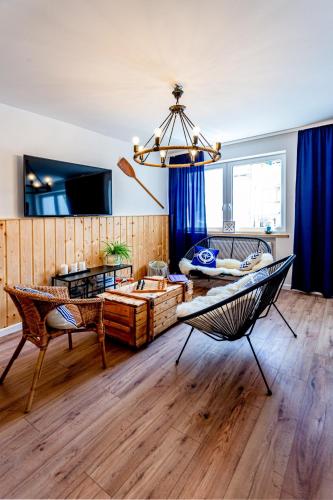 Közös társalgó / TV, Hostel & Apartments Kołobrzeg (Hostel & Apartments Kolobrzeg) in Radzikowo