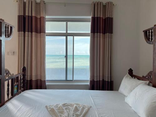 Visitor's Inn Room Type - Deluxe Triple Room with Sea View Visitor's Inn Room Type - Deluxe Triple Room with Sea View