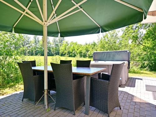 Balcony/terrace, Enticing Holiday Home in Reutum with Sauna in Reutum