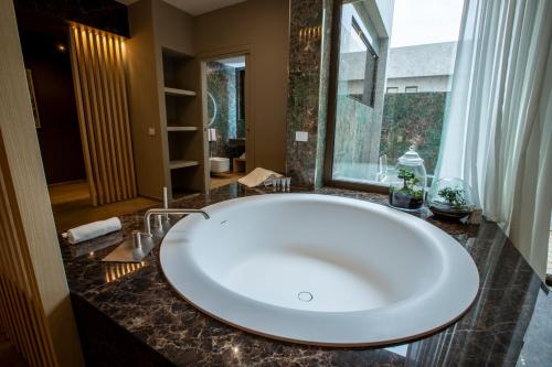 Fürdőszoba, UNA HOTELS MH Matera in Matera