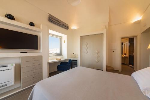 Insula Boutique Hotel - Tap to explore photos