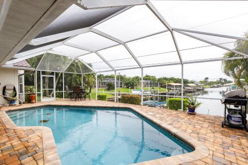 Villa La Bella Vita with Heated Pool at Waterfront Oasis! - Roelens Vacations - image 3