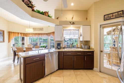 Villa La Bella Vita with Heated Pool at Waterfront Oasis! - Roelens Vacations - image 7
