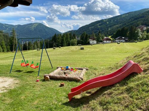 Parque infantil, Nockalm Cottage in Bad Kleinkirchheim