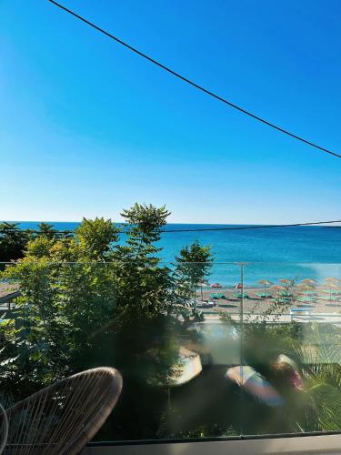 Delfini Beach Hotel & Suites Delfini Beach Hotel & Suites