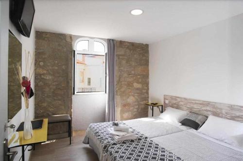 Litos al alojamento local