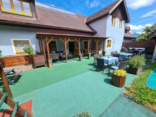 Сад, Pension Goschlberger in Мондзеє