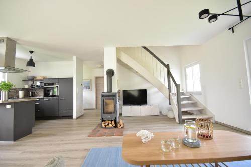 gedeelde lounge/tv-ruimte, Ostseehaus Boje in Krummin
