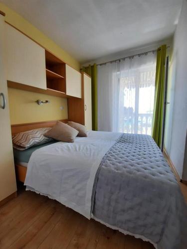 Apartments by the sea Pakostane, Biograd - 19005