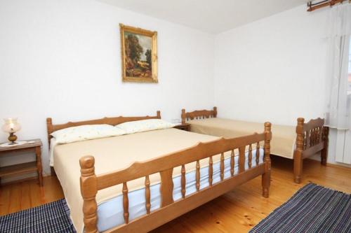 Apartments with a parking space Senj - 7475