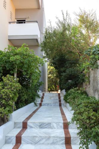 Manias Hotel Apartments - Tap to explore photos