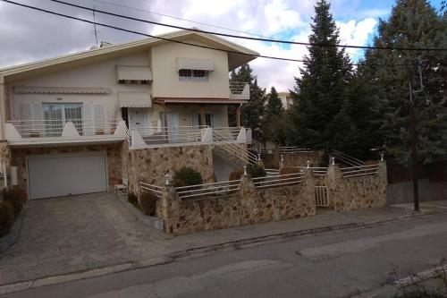 . THE STONE HOUSE