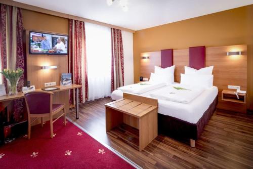 TIPTOP Hotel Burgschmiet Garni