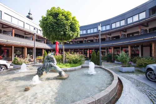 Aparthotel Schindlhaus und Koia Premium Apartments in Söll, Österreich