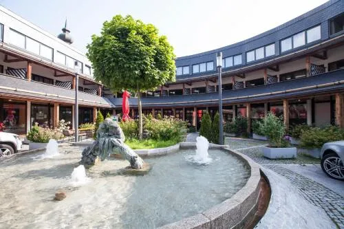 Aparthotel Schindlhaus und Koia Premium Apartments in Söll, Österreich