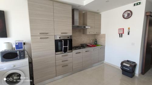 Konyha, Aquamarine Sea Front Apartments - Third Floor in Marsaskala