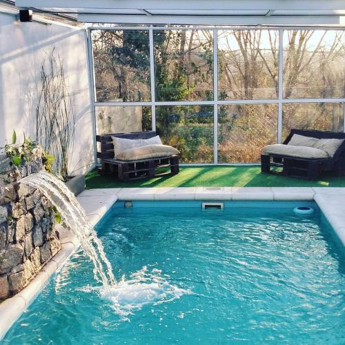 Altos del Pucara Piscina Climatizada vista a las sierras juegos infantiles
