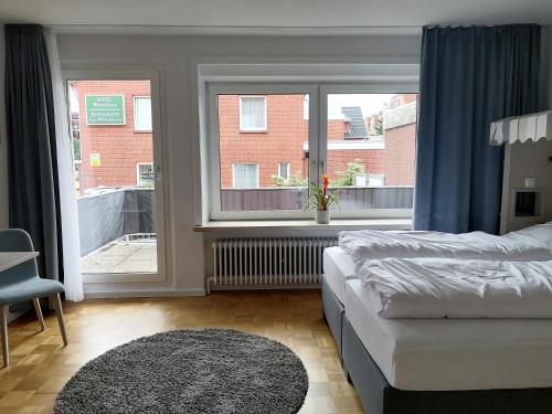 Deluxe Double Room with Balcony room in Hotel Pension Norddeich