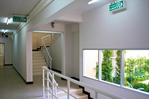 Entrance, Baanbudsarin Apartment in Sing Buri