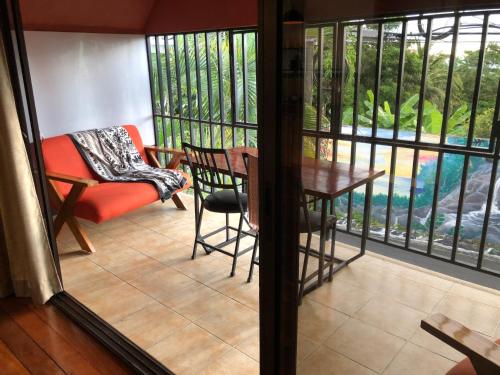 Balcony/terrace, Cockatoo Studio Apartments in Quepos