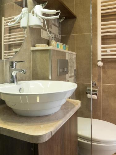 Boutique Hotel Filosofia - Tap to explore photos