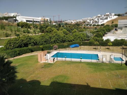 สระว่ายน้ำ, El Pescadito. Appartamento con piscina in Costa del Sol in ปวยร์โต เด เอสเตโปนา