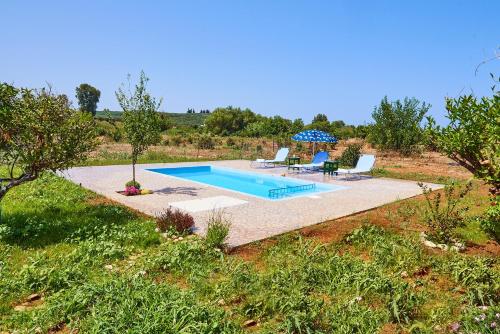 Garden, Platanos Stone House I With Shared Pool in Armeni